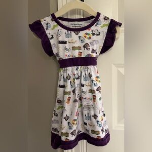 2T New Orleans landmark dress with purple trim